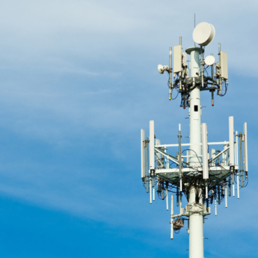 A Large Communications Tower on a Blue Sky